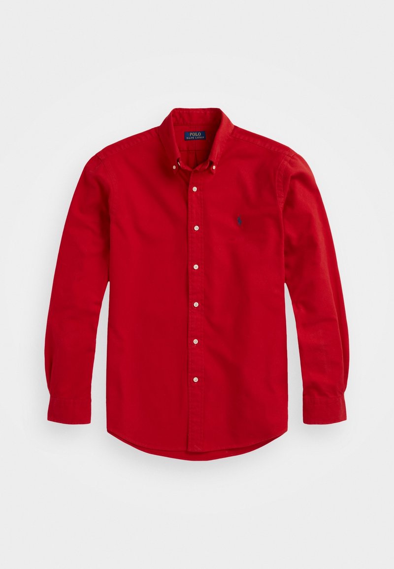 Camicia rossa a maniche lunghe con bottoni, realizzata in cotone. Presenta un colletto classico, orlo arrotondato e un piccolo logo ricamato sul petto.