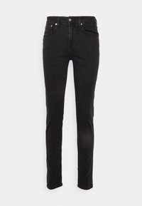 Jeans de mezclilla negra con un ajuste Slim, que cuentan con cinco bolsillos, cierre de botón y cremallera, y sutiles detalles de costura.