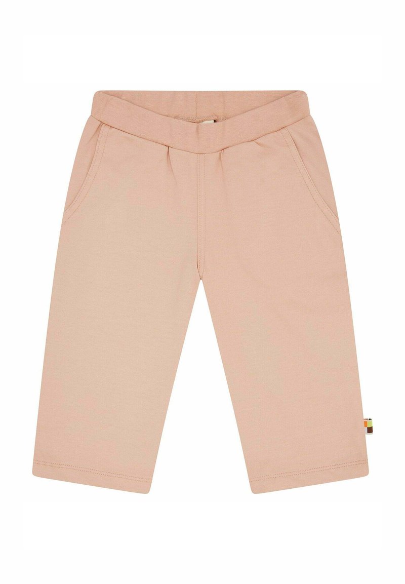 Helle rosa Baumwollhosen mit einem breiten elastischen Bund, zwei Seitentaschen und einem kleinen mehrfarbigen Etikett am Saum.