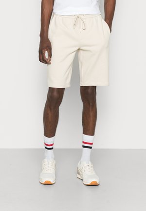 CONTRAST TAPE HWK - Tracksuit bottoms - eggshell
