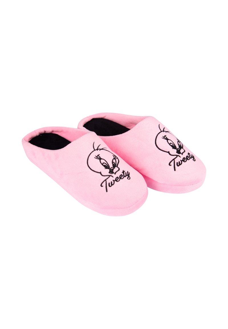 Pantofole rosa pelose con una consistenza morbida, caratterizzate da un design di Tweety Bird ricamato in nero e una forma arrotondata.