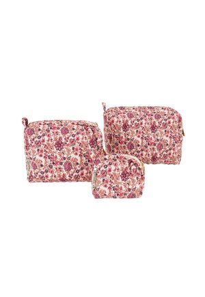 Trois pochettes en tissu à motifs floraux, de tailles petite, moyenne et grande, avec fermetures éclair et languettes en tissu.