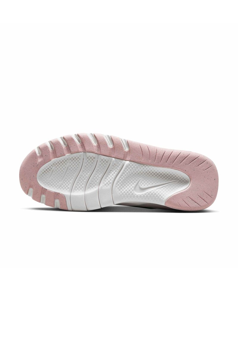 Nike sneaker sole featuring a pink rubber base with white textured sections and distinct grip patterns; includes a subtle logo detail.