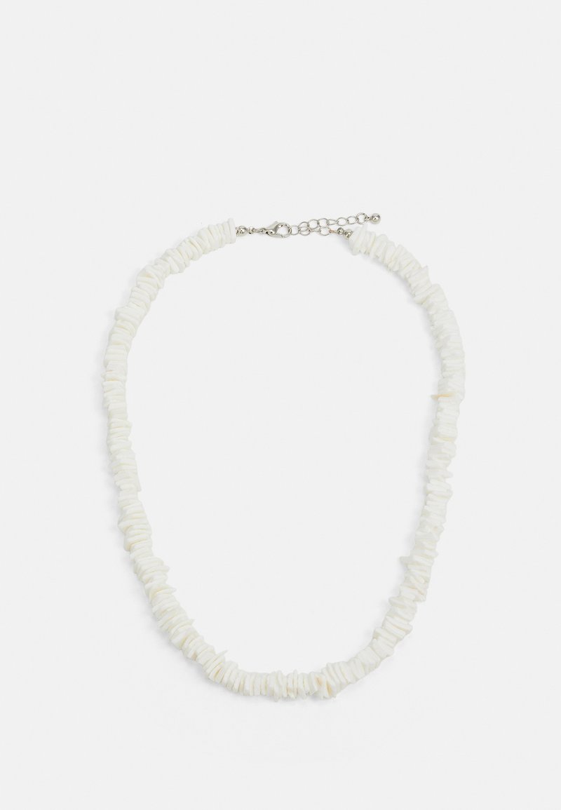 White necklace made of irregularly shaped beads, featuring a silver clasp and adjustable chain for length customization.