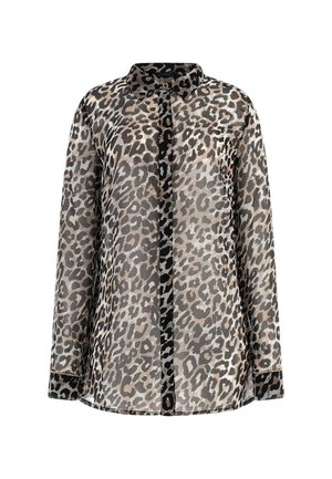 Blouse à manches longues à boutons avec imprimé léopard noir et beige, col classique et poignets bordés de noir.