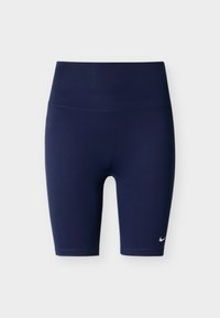 Shorts de sport bleu marine en tissu extensible, avec une taille haute et un petit logo Nike blanc sur la partie inférieure gauche de la jambe.
