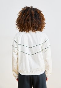 Nike Sportswear Spordijakk - sail/vintage green