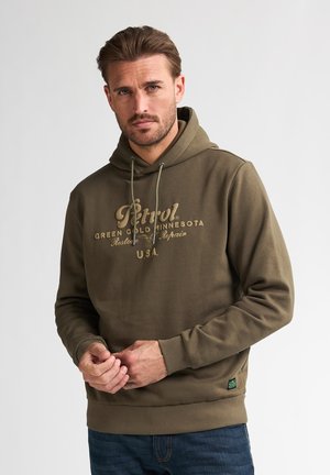 Olive green hoodie with drawstring, featuring a textured logo and graphics in light beige. Ribbed cuffs and hem with a label at the bottom.