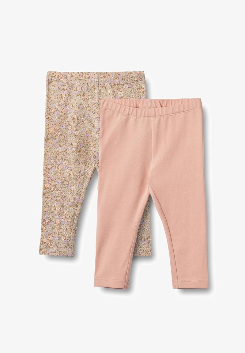 Zwei Paare von Kleinkind-Leggings, eine in einfarbigem hellrosa und eine beigen mit kleinen lila und braunen Blumenmustern, flach ausgelegt.