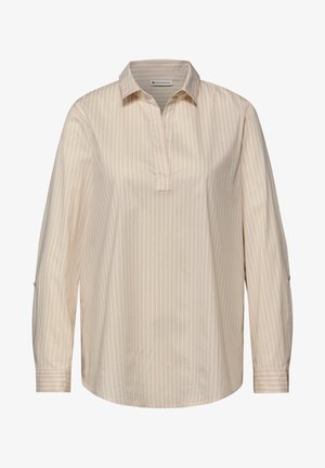 Beżowa koszula z długim rękawem, kołnierzykiem i plisą. Posiada pionowe białe paski oraz guziki na mankietach rękawów.