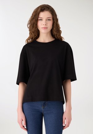 OVER A TINTA UNITA - T-shirt basic - nero