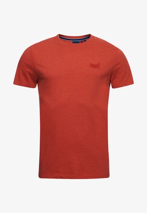 Czerwona bawełniana koszulka z krótkim rękawem, okrągłym dekoltem i subtelnym haftowanym logo na piersi. Prosty, jednolity design o miękkiej teksturze.