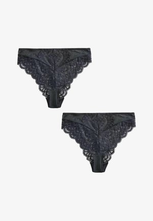 Zwarte kanten slip met een gekartelde rand, die een gladde stof combineert met ingewikkelde kanten details en een mid-rise pasvorm.