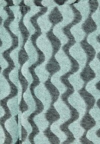 Textured fabric featuring a wavy pattern in shades of mint green and dark gray, with a soft, plush appearance and slightly raised design.