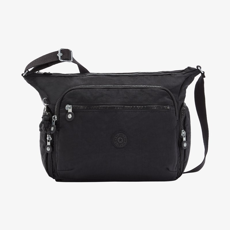Borsa a tracolla nera in nylon testurizzato, con numerose tasche con cerniera, tracolla regolabile e dettaglio del logo circolare.