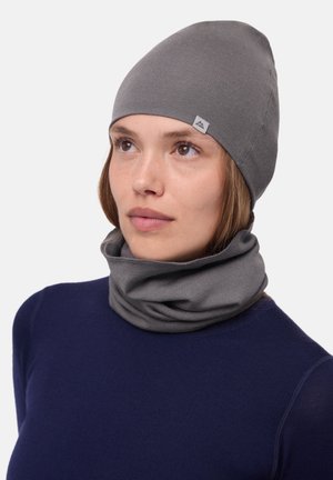 Gray rib-knit beanie and matching neck gaiter made of a soft, textured fabric. The beanie is fitted, while the gaiter is adjustable and doubled.