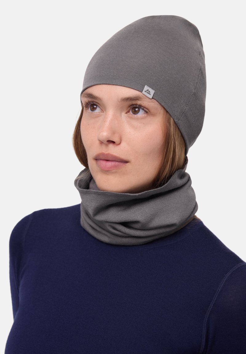 Gray rib-knit beanie and matching neck gaiter made of a soft, textured fabric. The beanie is fitted, while the gaiter is adjustable and doubled.
