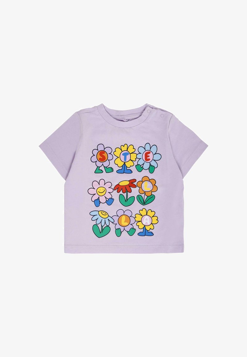 T-shirt en coton lilas avec des graphiques de fleurs colorées et le mot "STELLA" en lettres majuscules, avec un col rond et des manches courtes.