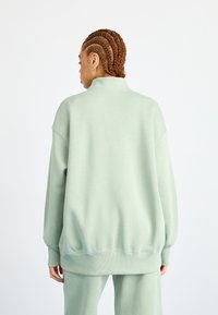 Nike Sportswear LOGO - Mikina - jade horizon/light orewood/sequoia