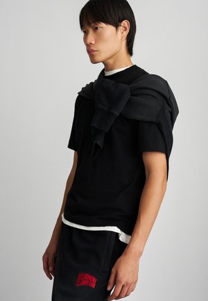 OVERSIZED ARCH LOGO  - Træningsbukser - washed black