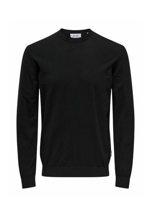 Pull noir à col rond fabriqué en tissu doux, avec des manches longues et des poignets côtelés. Design simple sans motifs ni logos visibles.