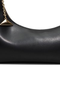 Black faux leather handbag with a smooth texture, featuring a gold-tone triangular accent and chain detail. Sleek, curved design.