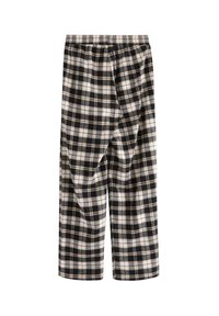 Sorte og beige ternede pyjamasbukser lavet af blødt stof, med elastisk talje og løs pasform, med et markant ternet mønster over det hele.