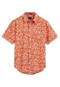 Camicetta a maniche corte in tessuto arancione brillante con un motivo floreale bianco, placket con bottoni davanti e un design del colletto classico.