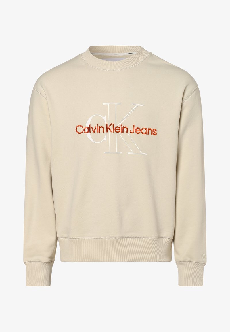 Beige sweatshirt met geribbelde manchetten en zoom, met "Calvin Klein Jeans" in oranje en wit gedrukt op de voorkant. Zachte stoftextuur.