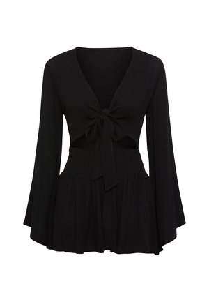 Μαύρη μπλούζα με βαθύ ντεκολτέ σε σχήμα V, λεπτομέρεια με δέσιμο στο μπροστινό μέρος και μακριά φαρδιά μανίκια. Διαθέτει σφηκοφωλιά στη μέση και ρέουσα ύφανση.