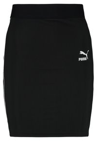 Mini-jupe noire côtelée avec une large taille et un logo Puma blanc sur le côté. Le matériau offre une coupe ajustée et extensible.