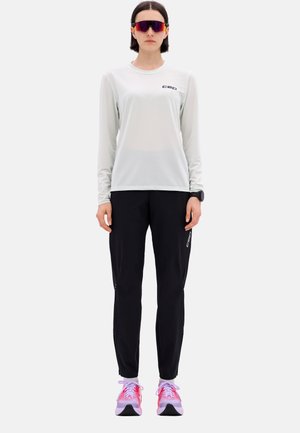 CORE RUN - Trousers - black
