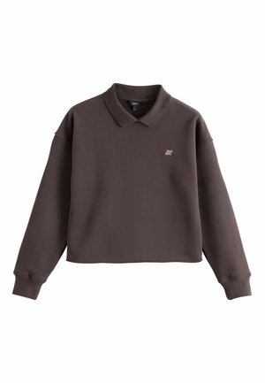 Dunkelbraunes, langärmeliges, kurz geschnittenes Poloshirt mit gerippten Bündchen und kleinem, gesticktem Logo auf der linken Brust.