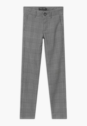 Graue, schlanke Hose mit schwarz-weiß kariertem Muster, vorderer Knopfverschluss, Gürtelschlaufen und Seitentaschen.