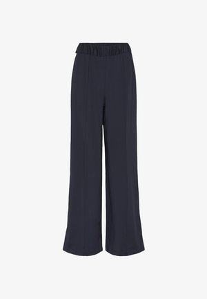 Tumesinised laiad püksid elastse vöökohtadega ning lihtsa õmbluse detailidega ees.