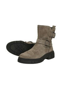 Suède enkelboots in lichtgrijs met twee verstelbare gespen. Rubberen zool met een gestructureerde grip. Klassiek ontwerp met gestikte accenten.