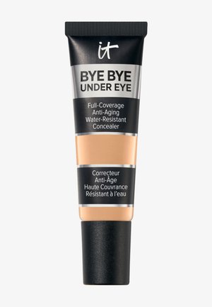 Tubo de IT Bye Bye Under Eye, corrector de cobertura total, anti-edad y resistente al agua, con tapa negra y envase en negro, plata y beige.