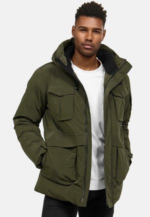 Olive green insulated jacket with a hood, featuring multiple front pockets and a zipper closure. Soft inner lining, durable material.