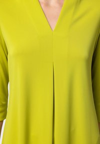 NAULOVER Maglietta a manica lunga - green