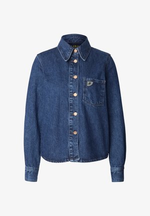 Džinsinis marškiniai su apykakle, priekiu su sagomis, ilgomis rankovėmis, vienu krūtinės kišene, tamsiai mėlynos spalvos su vario spalvos sagomis ir siūlėmis.