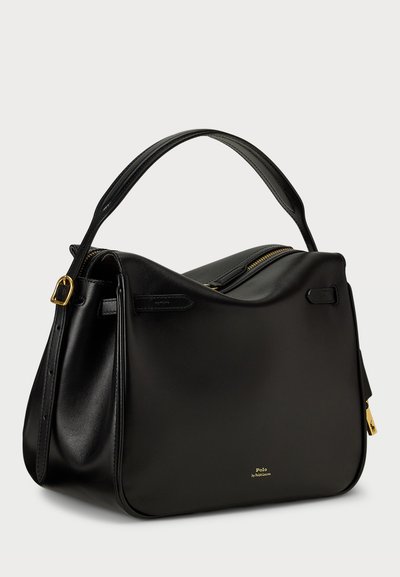 Juoda odinė rankinė su struktūrizuota forma, viršutiniu užtrauktuku ir trumpa rankena. Su auksinėmis detalėmis ir subtiliu logotipo akcentu.