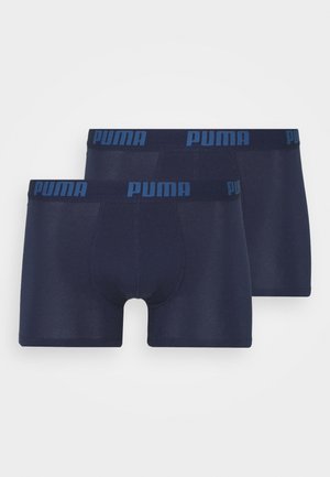 Marineblaue Boxershorts aus weichem Material, mit einer figurbetonten Passform und einem kontrastierenden blauen Bund mit Detail des "PUMA"-Logos. Im Doppelpack.