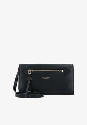 Čierna DKNY crossbody peňaženka s predným vreckom na zips, zlatým zipsom a nastaviteľným popruhom na bielom pozadí.