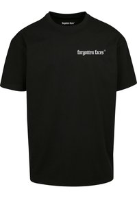 Must must t-särk lühikeste varrukatega, ümmargune kaelus ja esipaneelil valge logoga. Lihtne disain, sirge lõige ja sile tekstuur.
