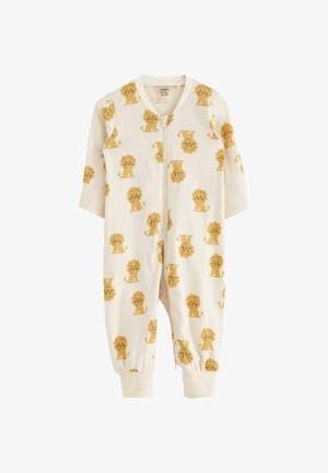 Vitt bomullsoverall med korta ärmar; har ett gult lejontryck över hela plagget och en dragkedja fram för stängning. Elastiska muddar vid anklarna.