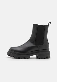Tamaris Stivaletti con plateau - black