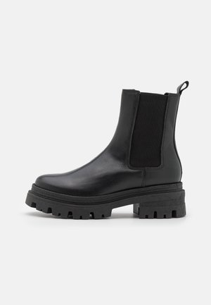 Stivaletti con plateau - black