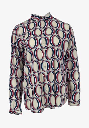 Pitkähihainen napillinen paita kevyestä kankaasta, jossa on geometrinen, monivärinen kuvio päällekkäisistä punaisista, sinisistä ja kerma-värisistä ympyröistä.