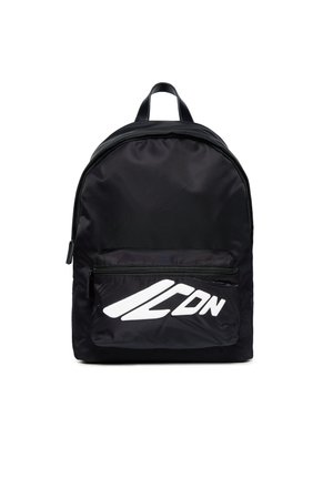 Black nylon backpack with a rounded shape, featuring a front zip pocket and a large white graphic logo on the front panel.