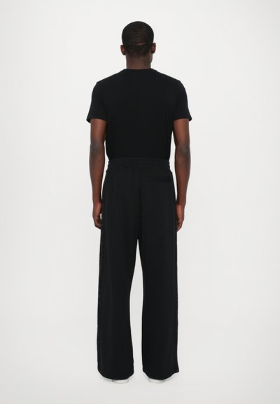 Les Benjamins Παντελόνι φόρμας - black